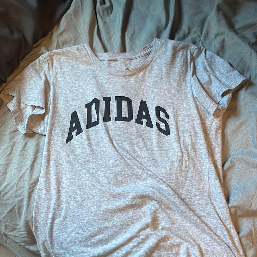 This is a Adidas Shirt, Size medium in Women